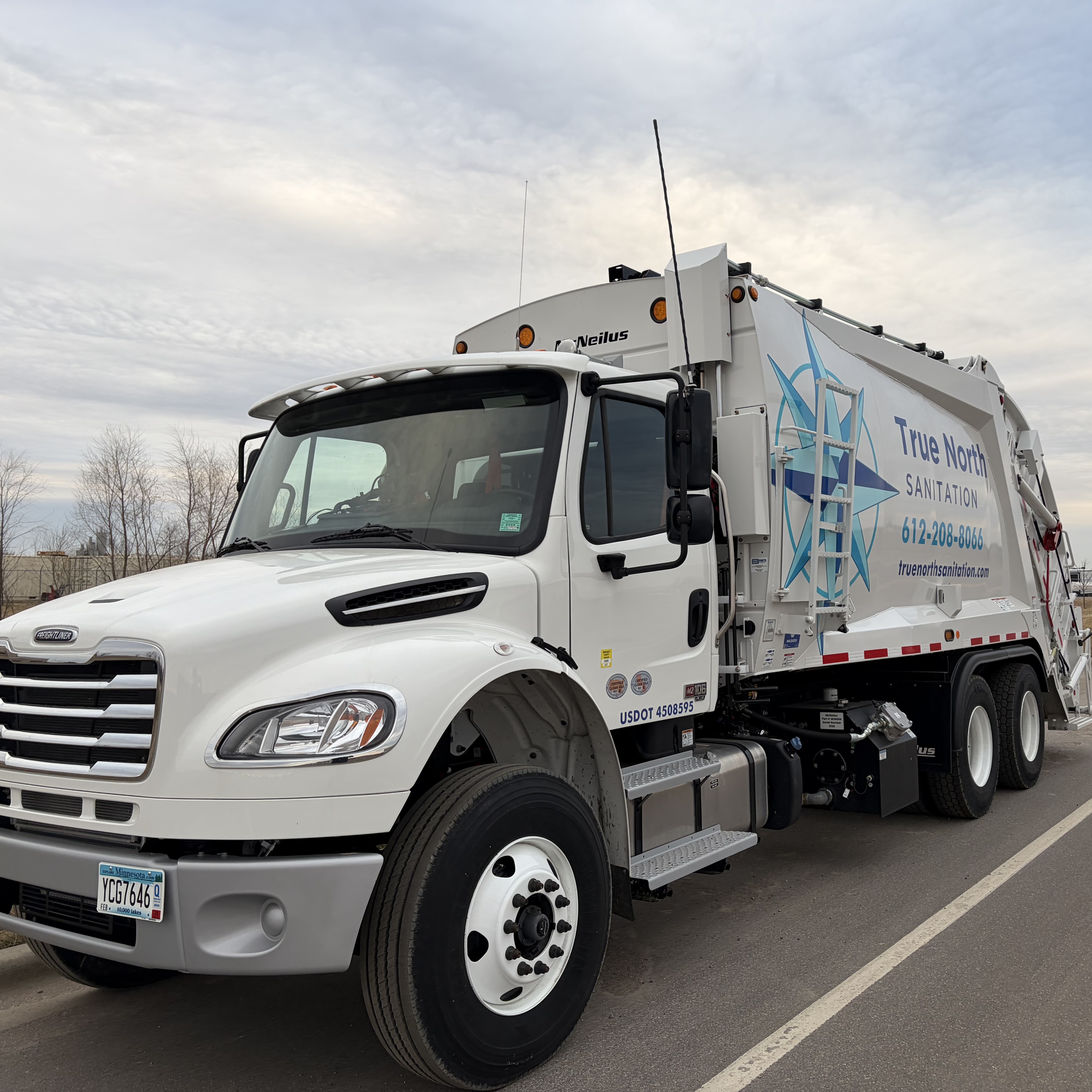 True North Sanitation truck on the road in the North Metro